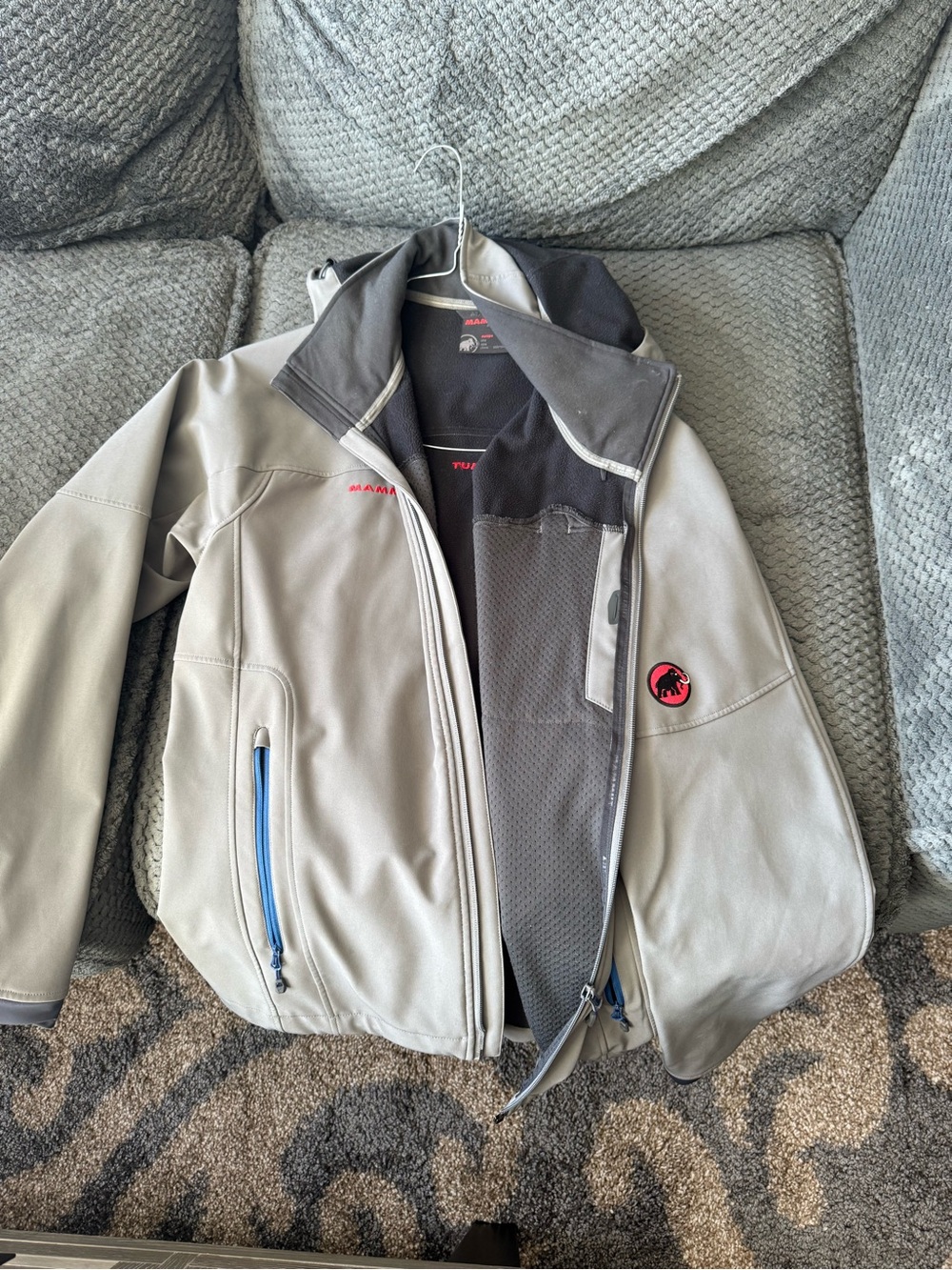 Mammut Men's Light Gray Softshell Jacket with Blue Zipper Accents